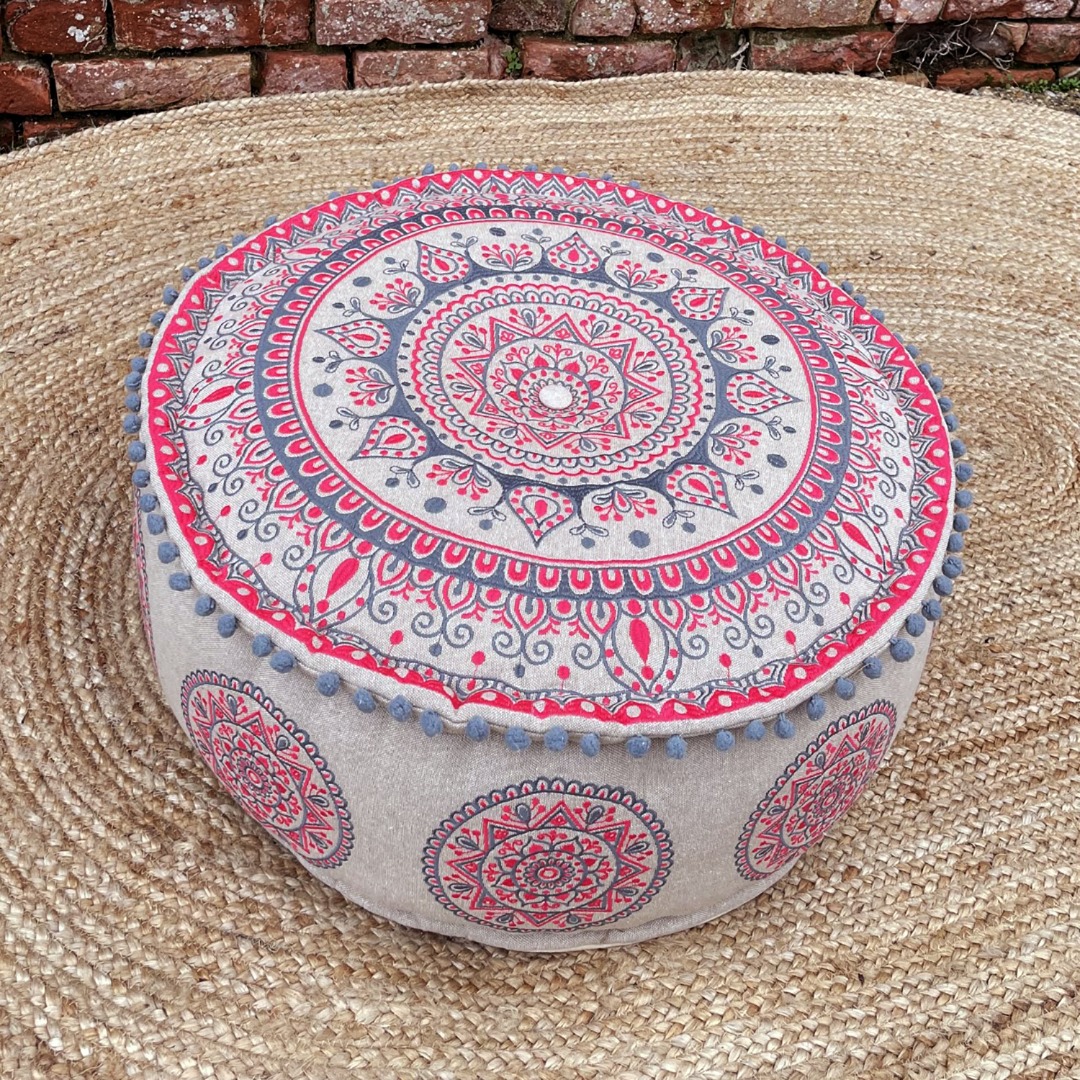 Pink and grey-blue mandala patterned pouffe or low seat with pretty mini pom-pom trim